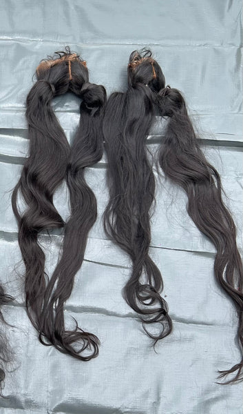 BLACK PONYTAILS