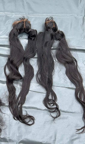 BLACK PONYTAILS